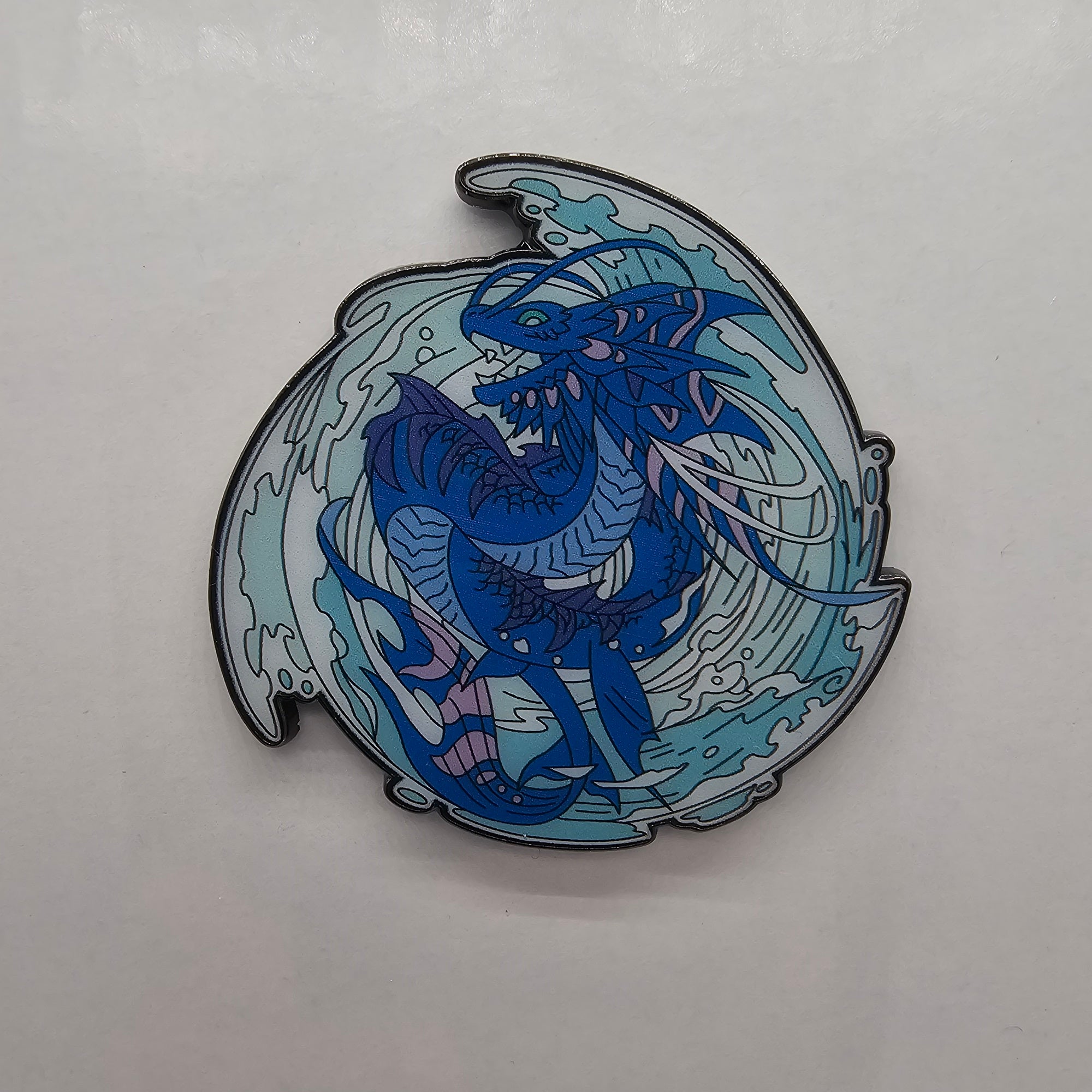 Tiden, Water Dragon Pin
